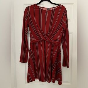 Excellent condition lily rose a-line dress with accented waist. Boatneck